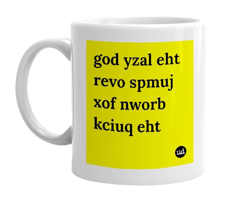 White mug with 'god yzal eht revo spmuj xof nworb kciuq eht' in bold black letters