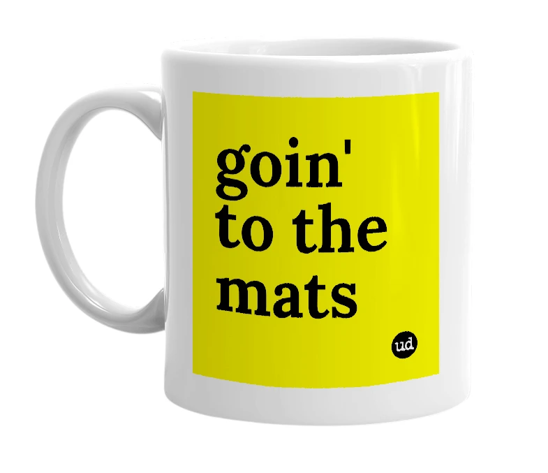 White mug with 'goin' to the mats' in bold black letters