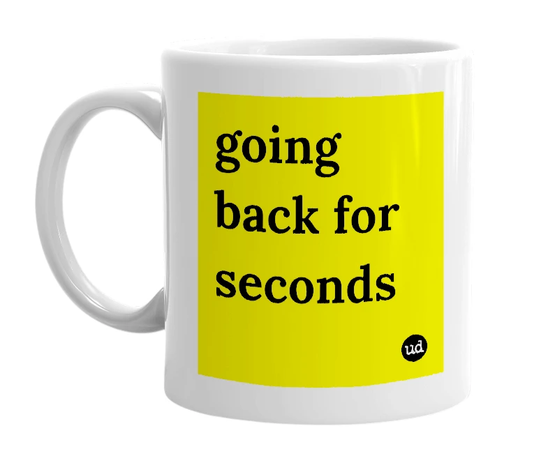 White mug with 'going back for seconds' in bold black letters