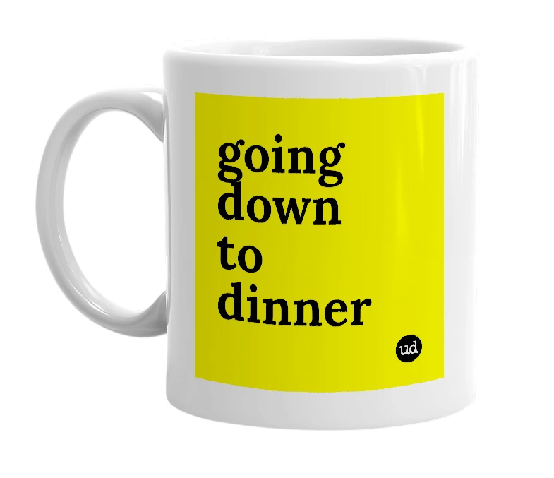 White mug with 'going down to dinner' in bold black letters