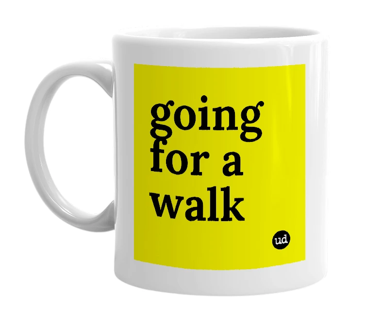 White mug with 'going for a walk' in bold black letters