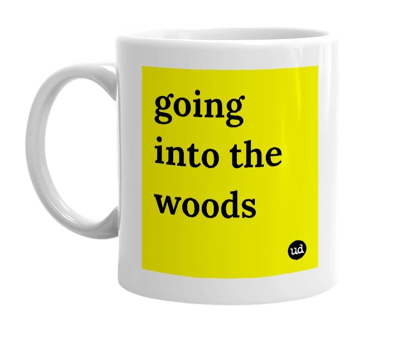 White mug with 'going into the woods' in bold black letters