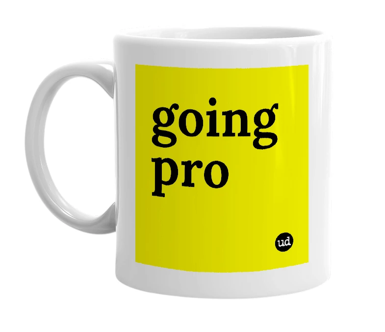 White mug with 'going pro' in bold black letters