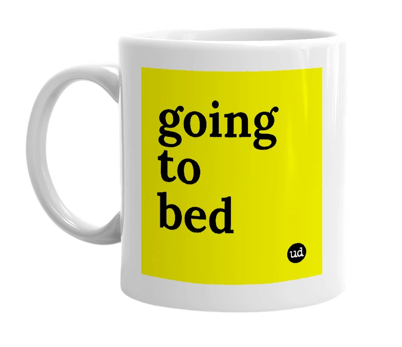 White mug with 'going to bed' in bold black letters