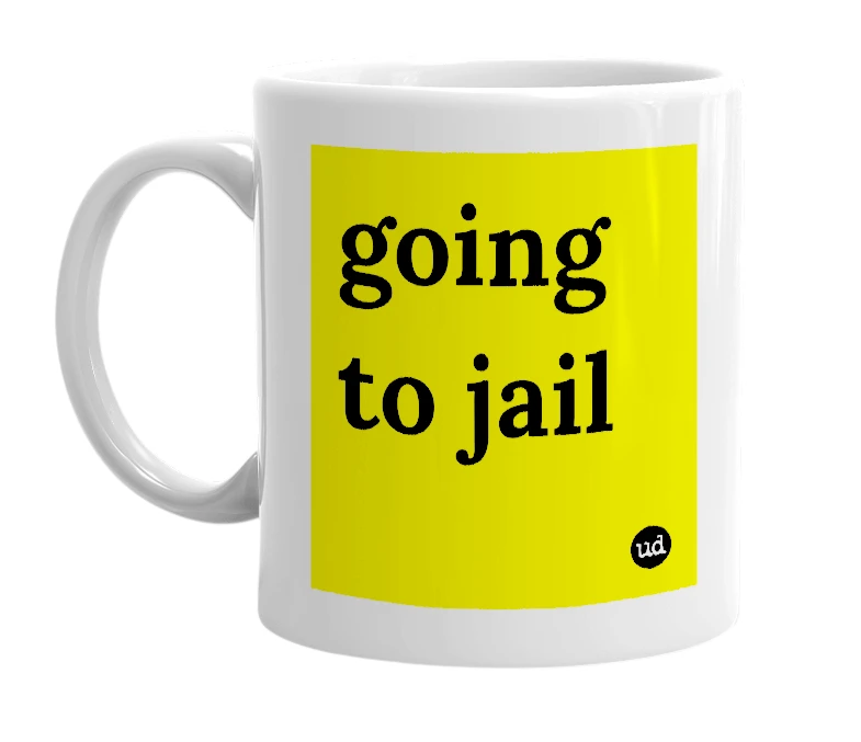 White mug with 'going to jail' in bold black letters