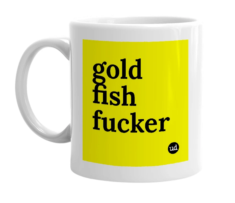 White mug with 'gold fish fucker' in bold black letters