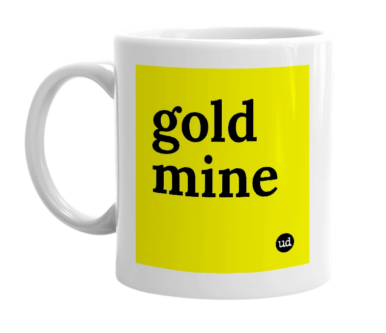 White mug with 'gold mine' in bold black letters