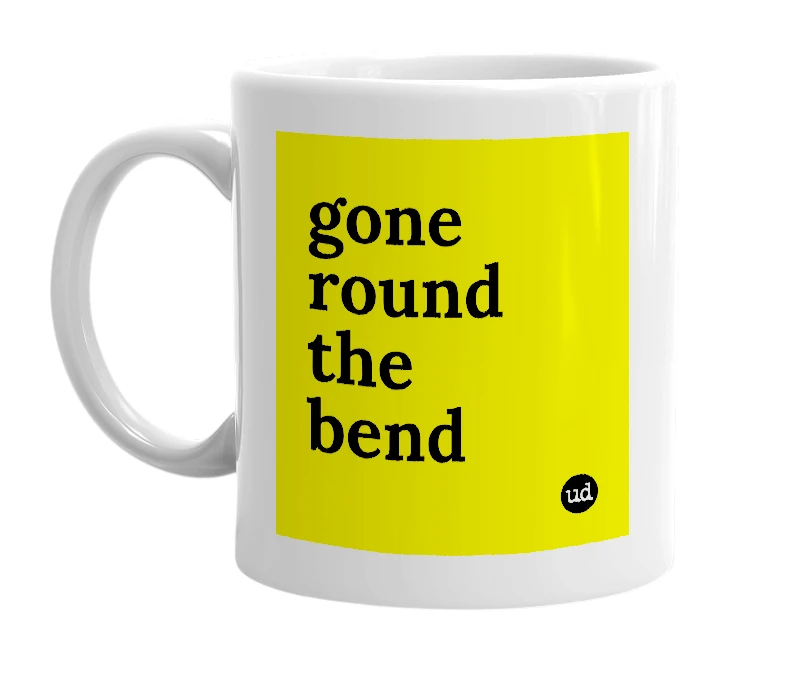 White mug with 'gone round the bend' in bold black letters