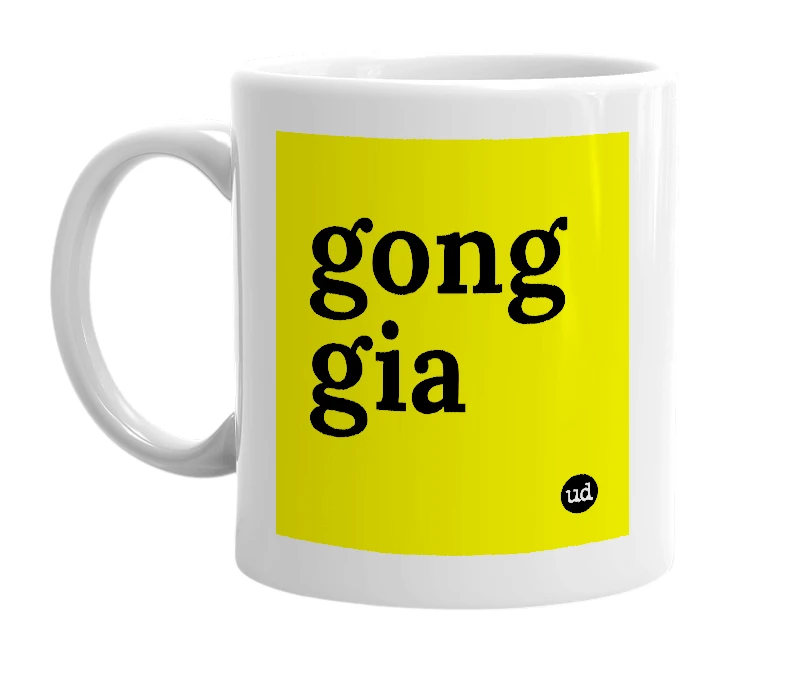 White mug with 'gong gia' in bold black letters