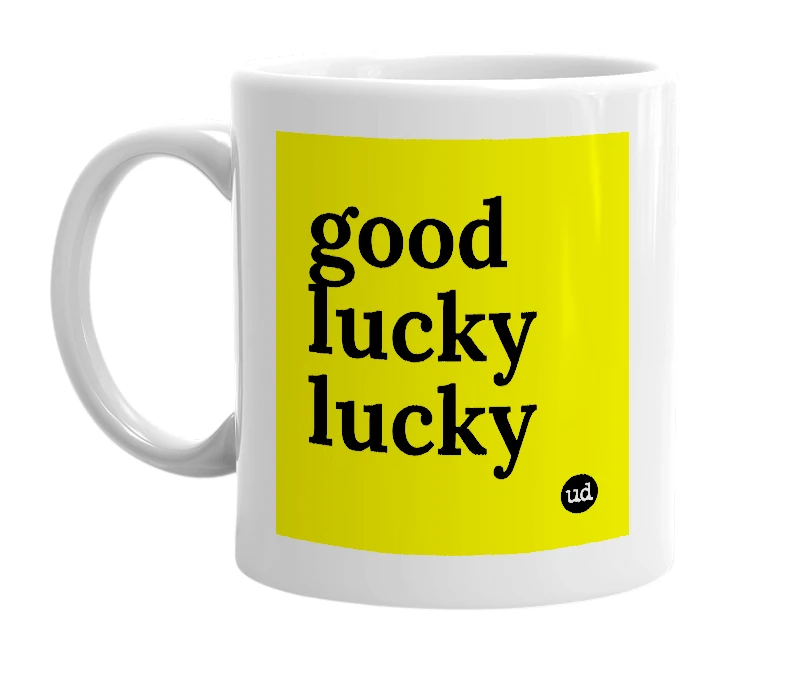 White mug with 'good lucky lucky' in bold black letters