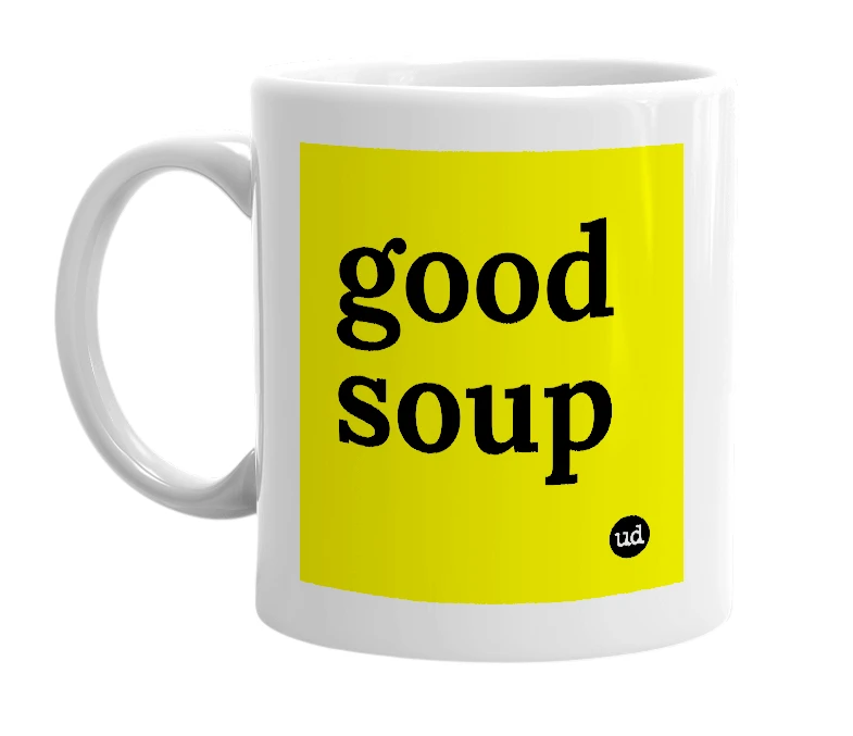 White mug with 'good soup' in bold black letters