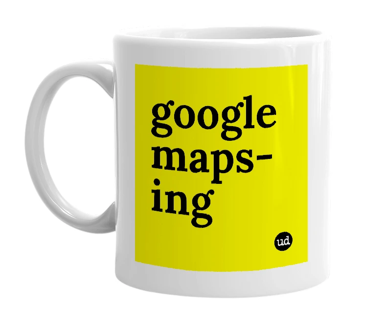 White mug with 'google maps-ing' in bold black letters