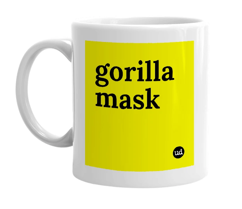 White mug with 'gorilla mask' in bold black letters