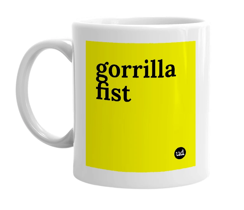 White mug with 'gorrilla fist' in bold black letters