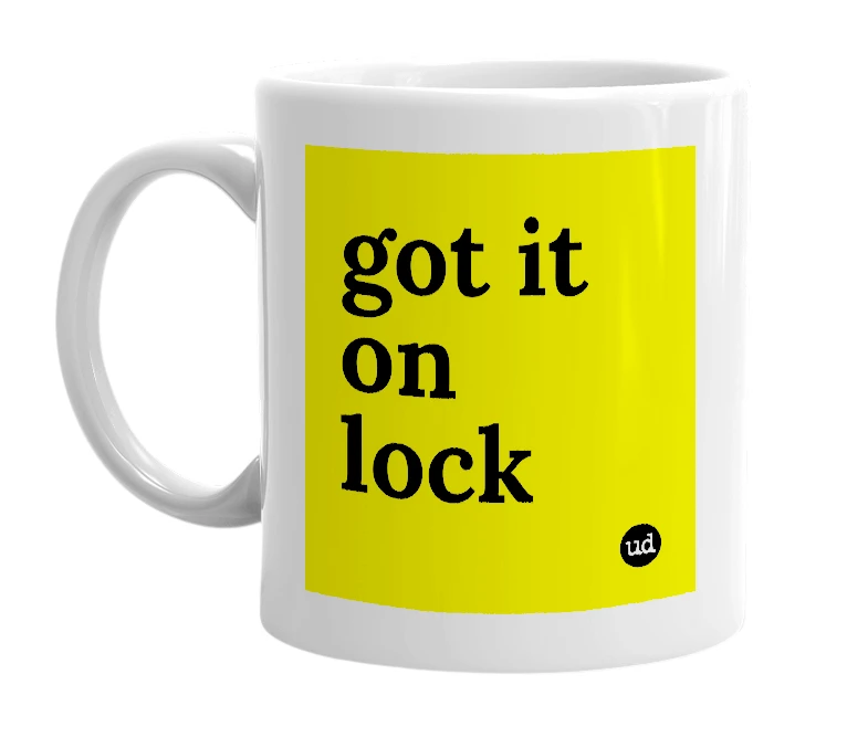 White mug with 'got it on lock' in bold black letters