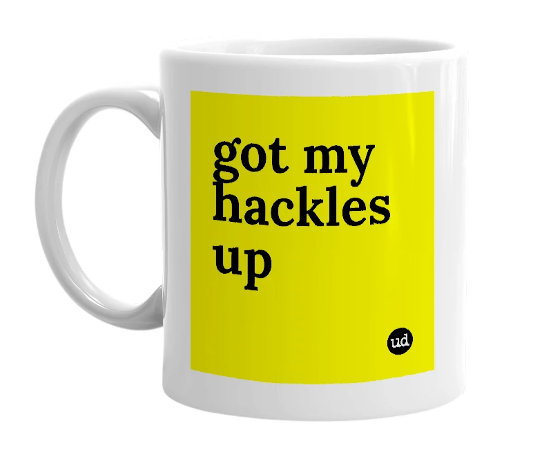 White mug with 'got my hackles up' in bold black letters
