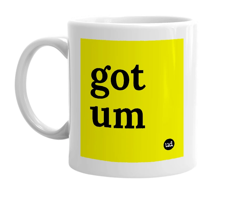 White mug with 'got um' in bold black letters