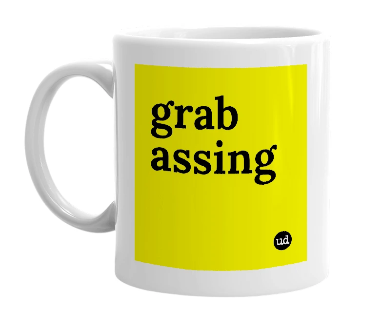 White mug with 'grab assing' in bold black letters