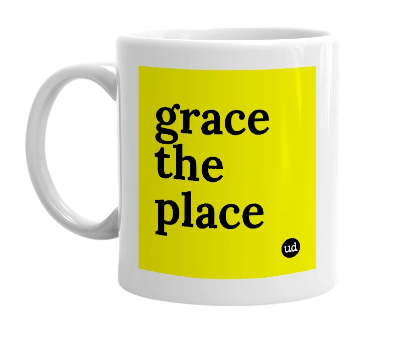White mug with 'grace the place' in bold black letters
