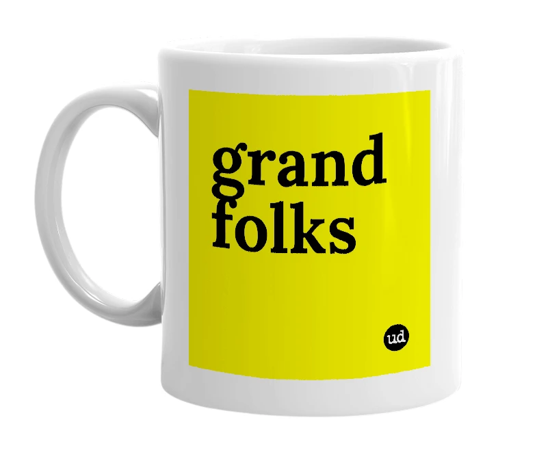 White mug with 'grand folks' in bold black letters