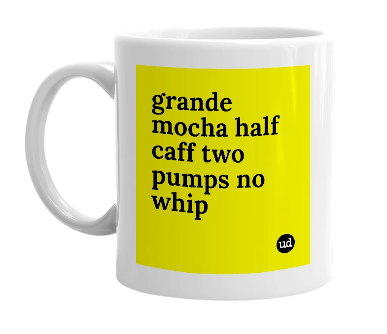 White mug with 'grande mocha half caff two pumps no whip' in bold black letters