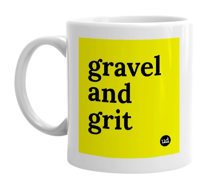 White mug with 'gravel and grit' in bold black letters