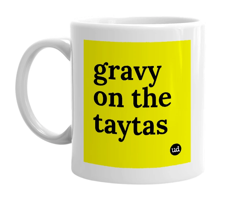 White mug with 'gravy on the taytas' in bold black letters