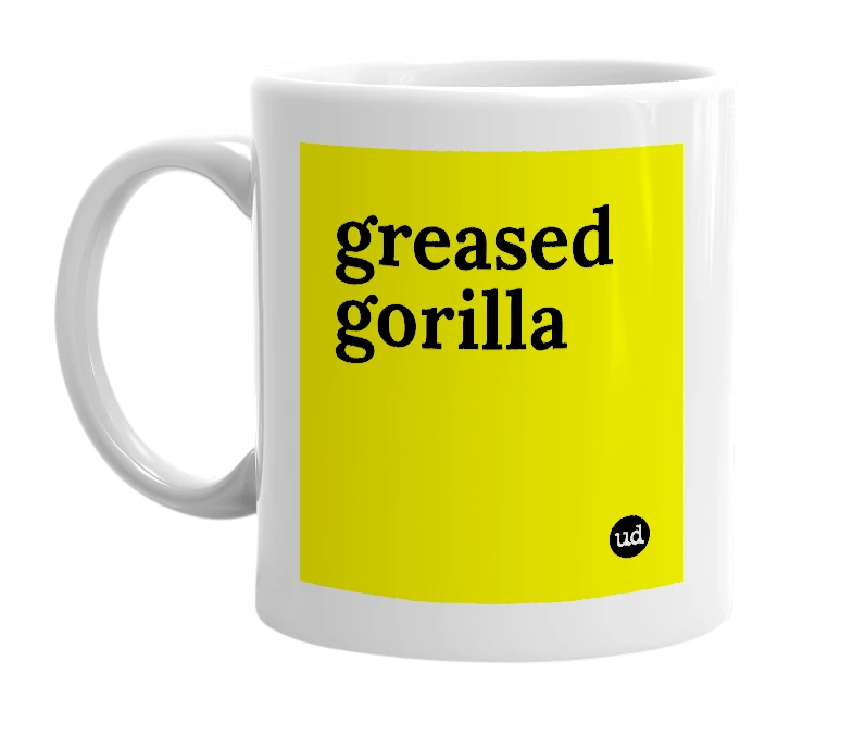 White mug with 'greased gorilla' in bold black letters