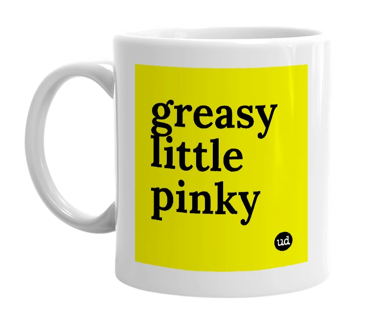 White mug with 'greasy little pinky' in bold black letters