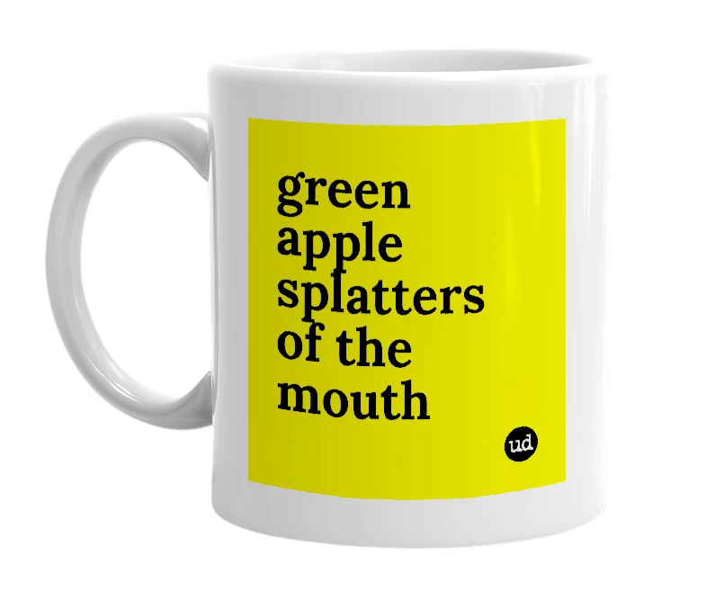 White mug with 'green apple splatters of the mouth' in bold black letters