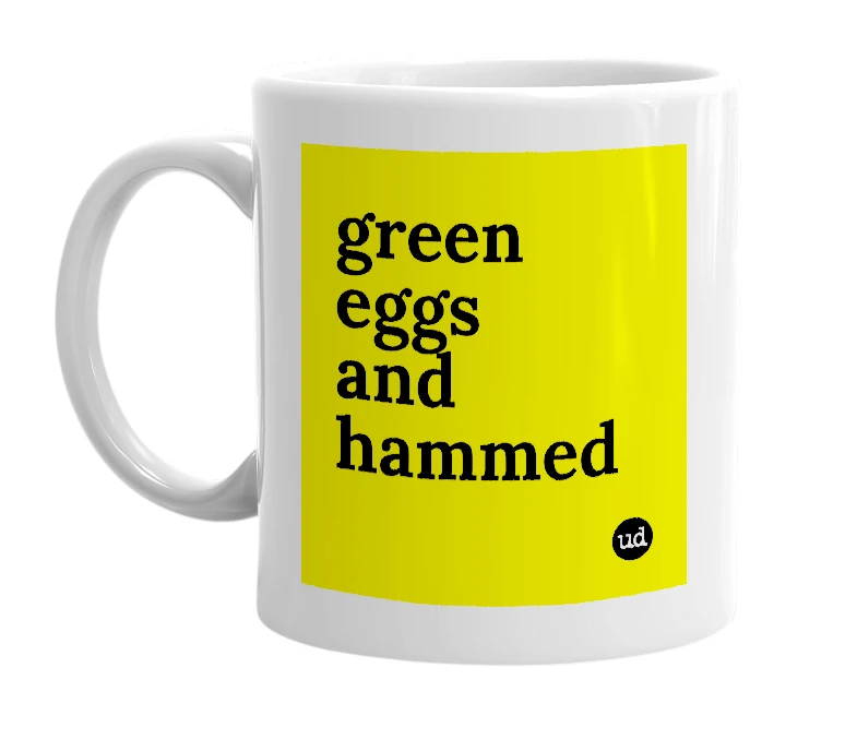 White mug with 'green eggs and hammed' in bold black letters
