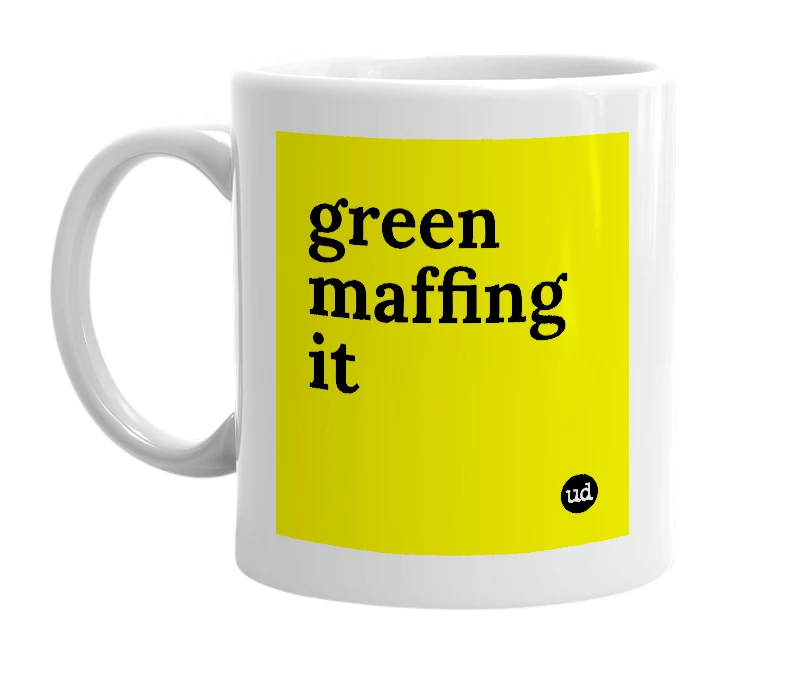 White mug with 'green maffing it' in bold black letters