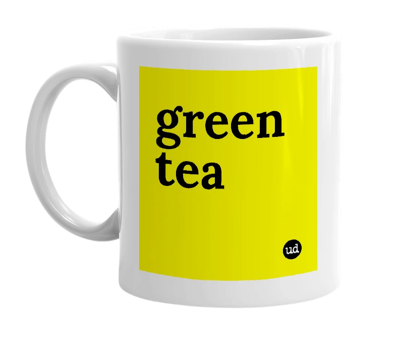 White mug with 'green tea' in bold black letters