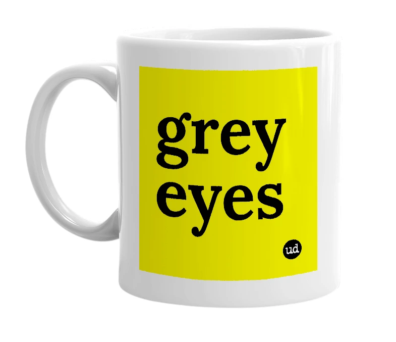 White mug with 'grey eyes' in bold black letters