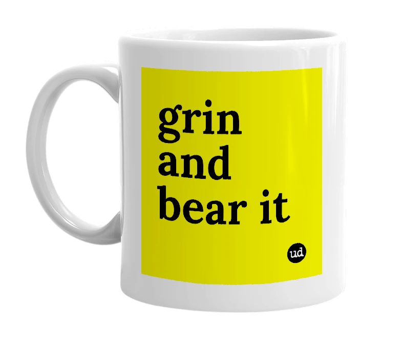 White mug with 'grin and bear it' in bold black letters