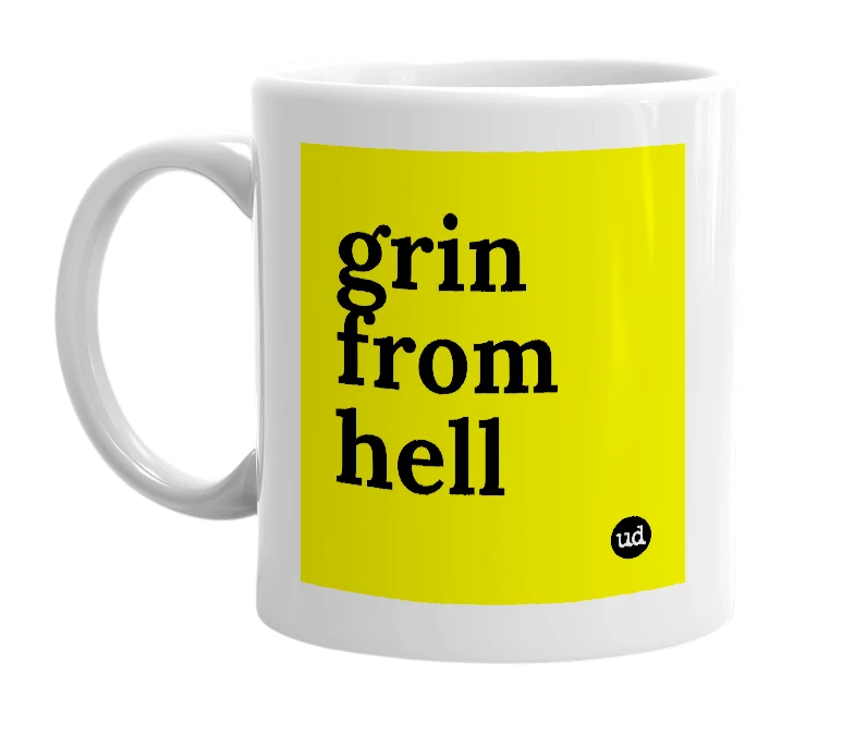 White mug with 'grin from hell' in bold black letters