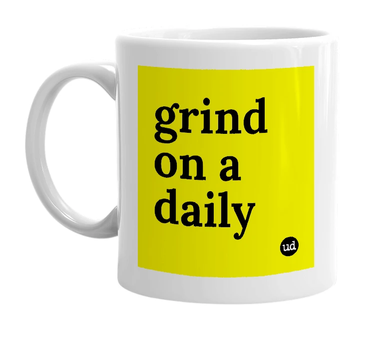 White mug with 'grind on a daily' in bold black letters
