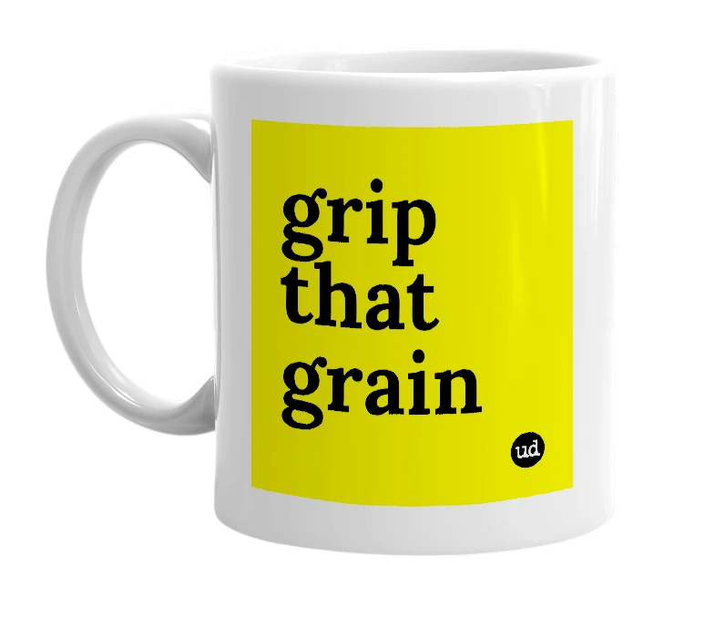 White mug with 'grip that grain' in bold black letters