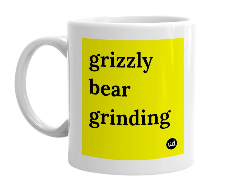 White mug with 'grizzly bear grinding' in bold black letters