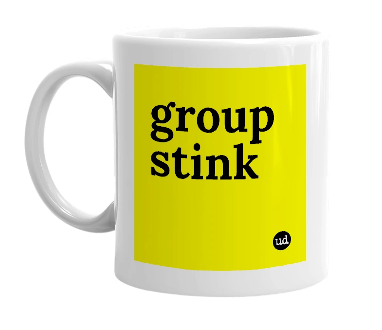 White mug with 'group stink' in bold black letters