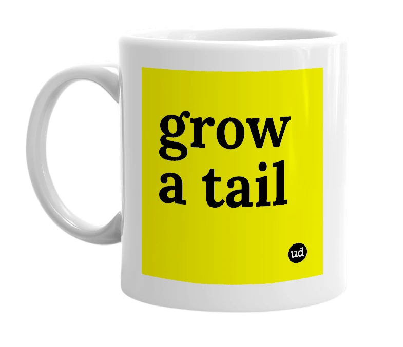 White mug with 'grow a tail' in bold black letters