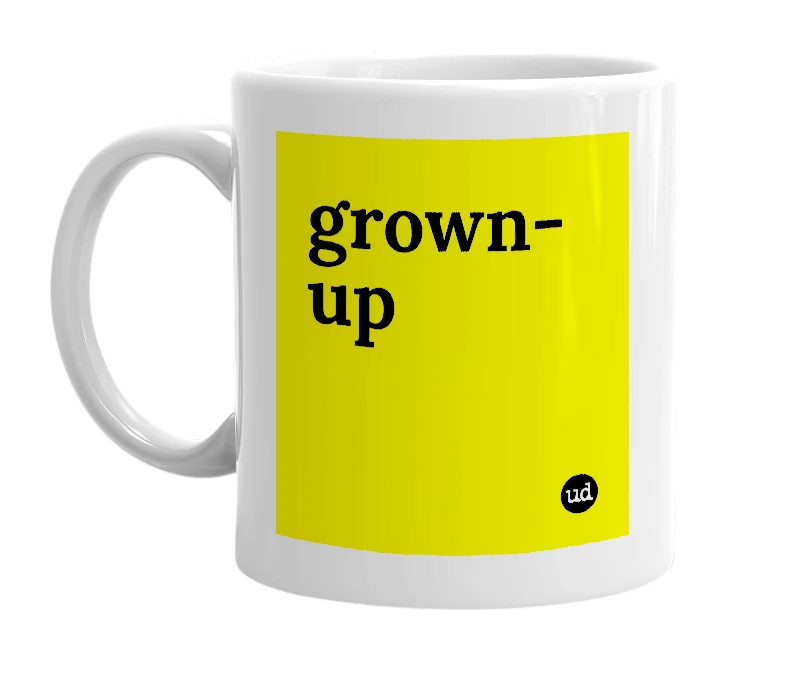 White mug with 'grown-up' in bold black letters