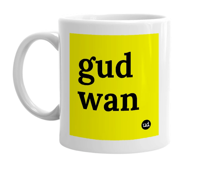 White mug with 'gud wan' in bold black letters