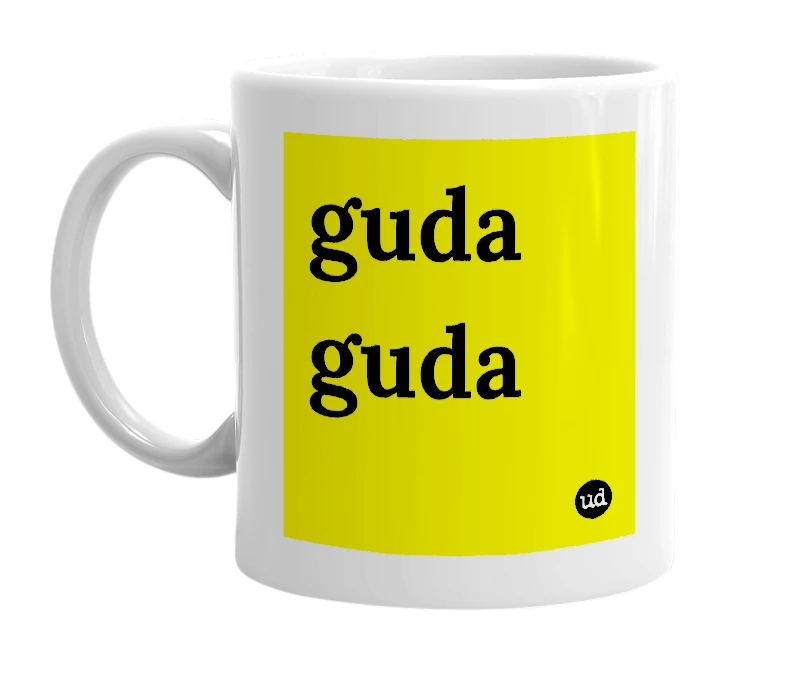 White mug with 'guda guda' in bold black letters