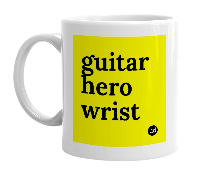 White mug with 'guitar hero wrist' in bold black letters