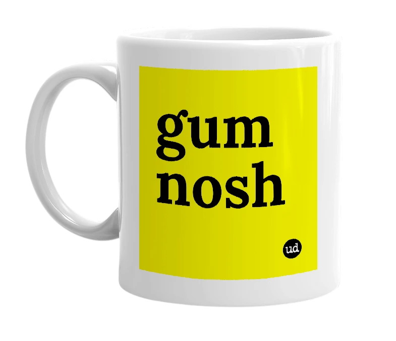 White mug with 'gum nosh' in bold black letters