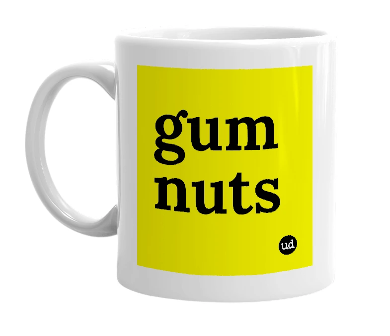 White mug with 'gum nuts' in bold black letters