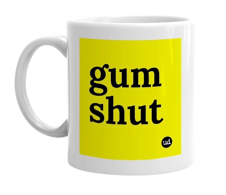 White mug with 'gum shut' in bold black letters