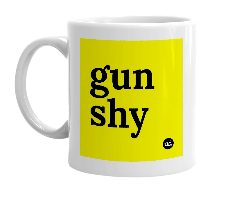 White mug with 'gun shy' in bold black letters
