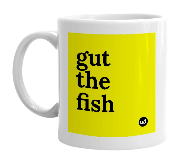 White mug with 'gut the fish' in bold black letters